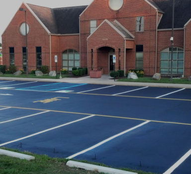 Sealcoating, Striping and Parking Stop Installation