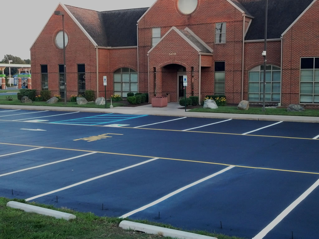 Sealcoating, Striping and Parking Stop Installation